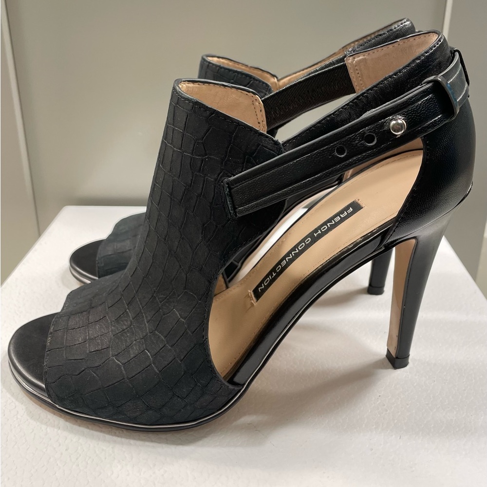 French Connection; black; textured; adjustable fastener on side; 4” heel